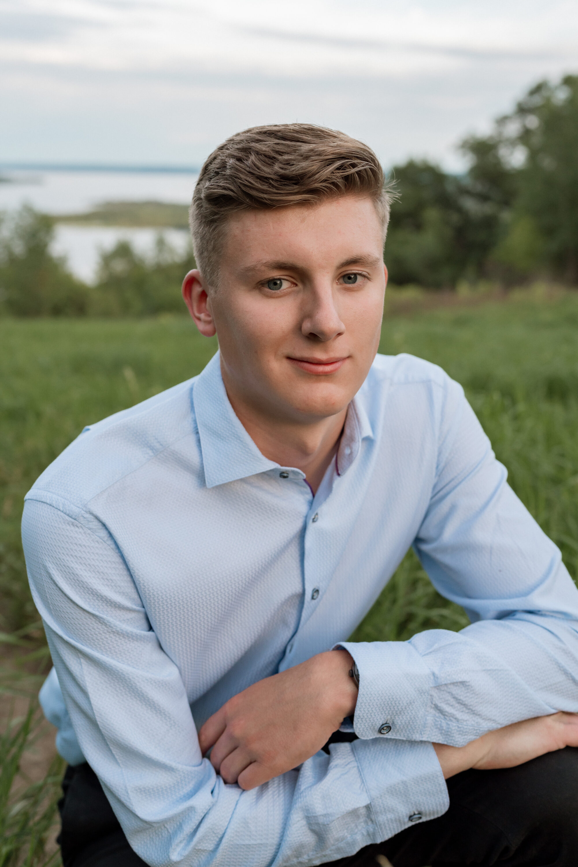 guy in nice dress shirt for his senior photos