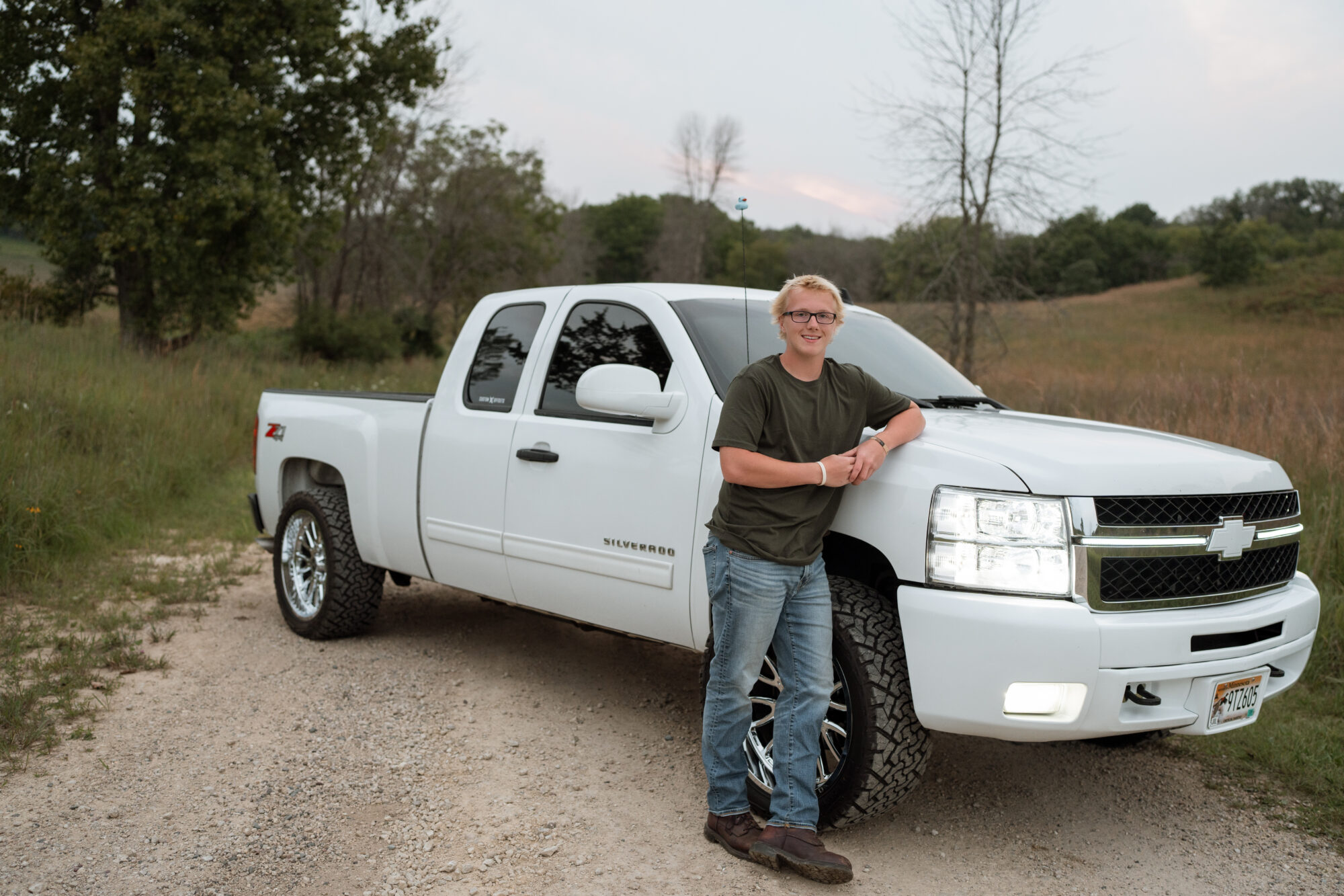 guy with his truck for his senior photos