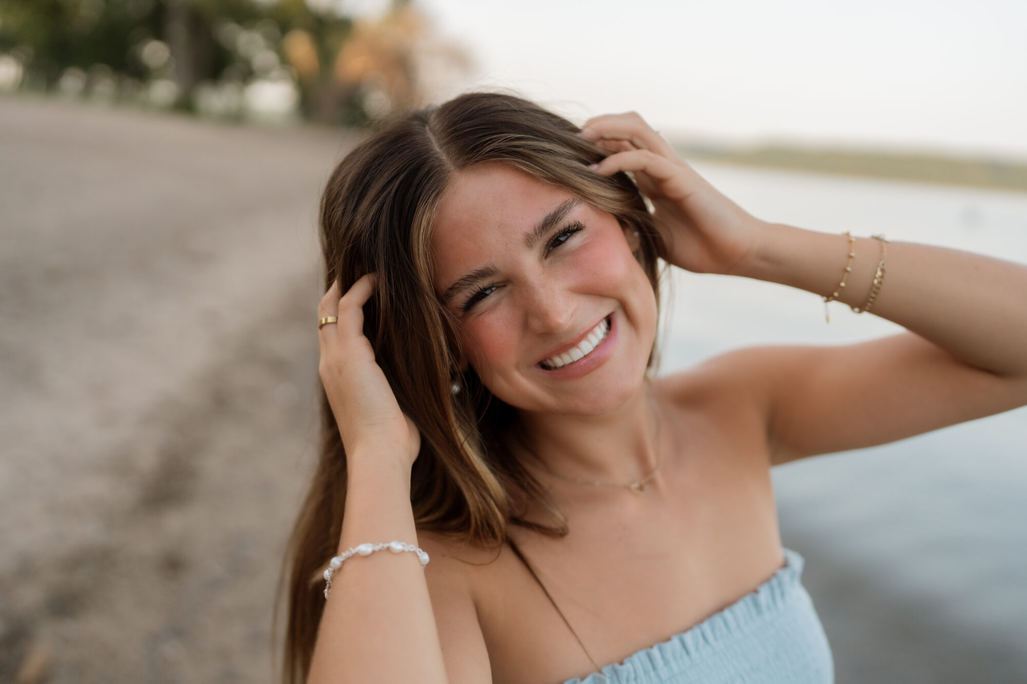 girl on beach for her Minnesota senior photos