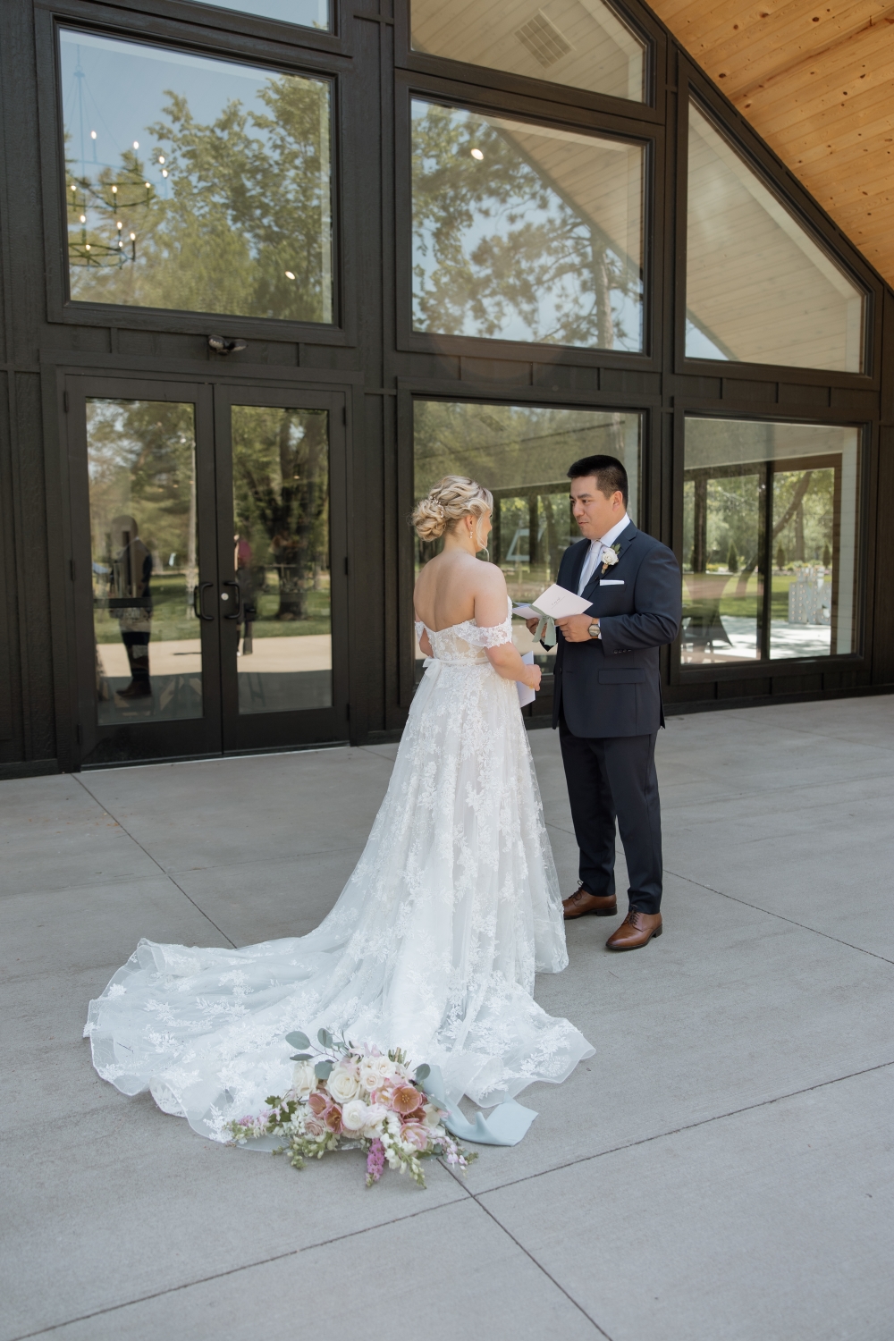 Lapointe Events Venue, real wedding shot by Jenna Swanson Photography
Bride & groom exchanging their first look