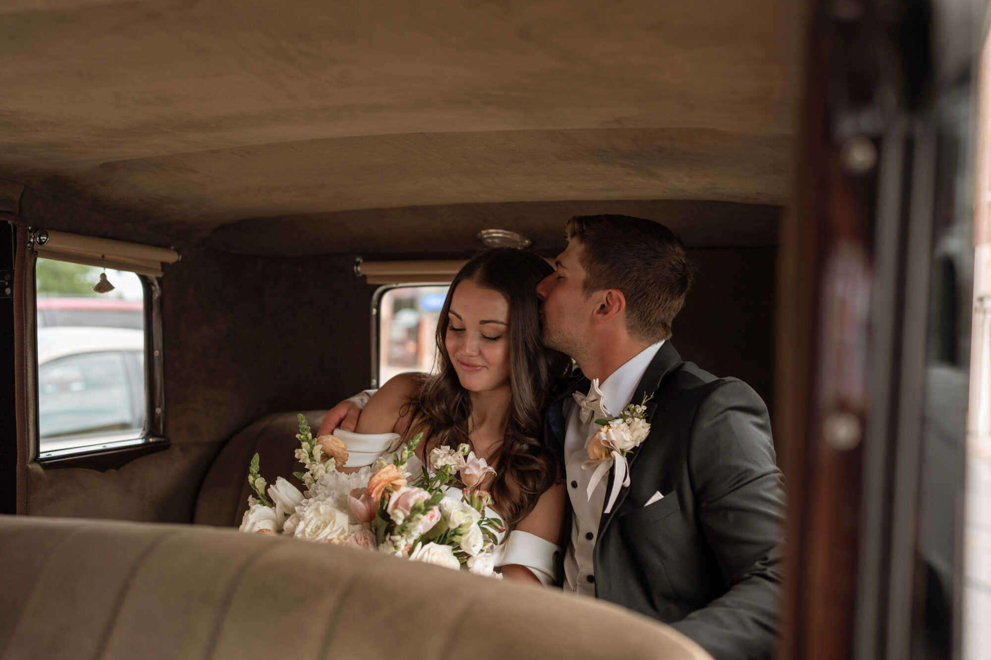 Couple portrait in vintage car at the 3 Ten Event Venue in Faribault, MN.