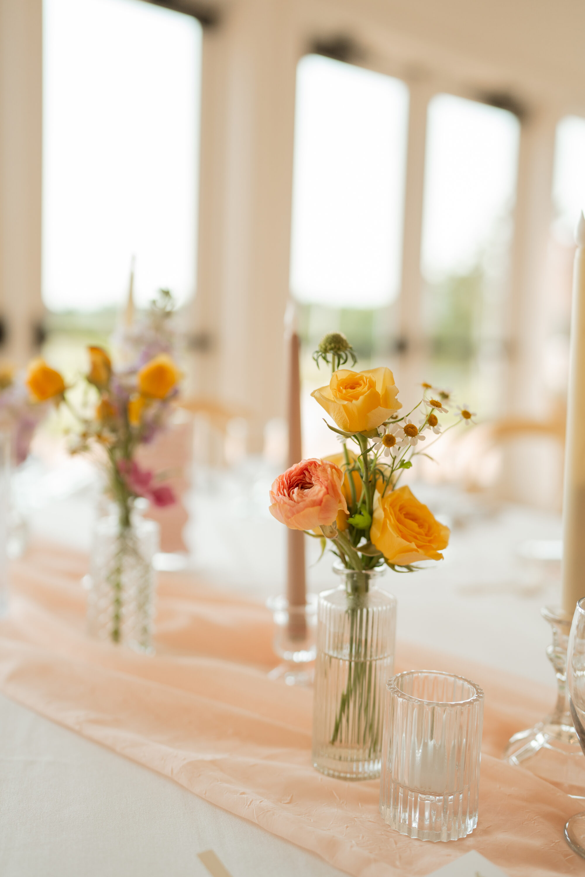 Wedding table detail shot of flowers.